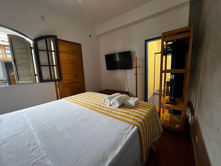 Suíte casal em casa à beira rio e de frente o mar