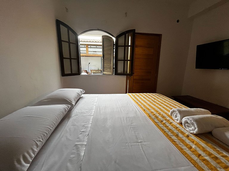 Suíte casal em casa à beira rio e de frente o mar